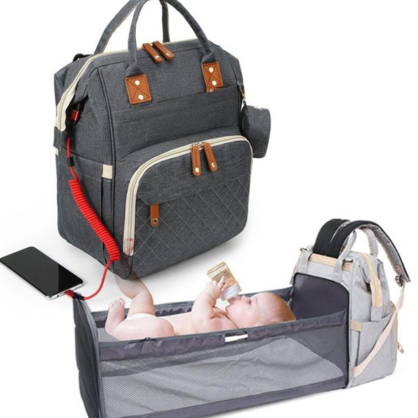 diaper bags 2021 usb portable folding crib bag multi-function large capacity baby backpack
diaper bags 2021 usb portable folding crib bag multi-function large capacity baby backpack