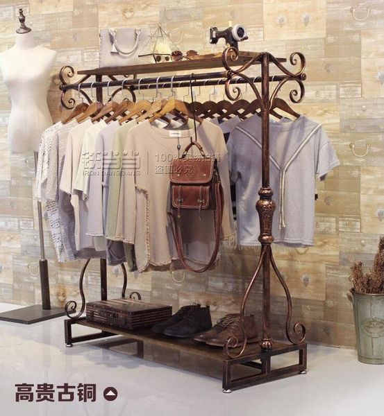 hangers & racks retro clothing shop display shelf with floor-mounted double-row clothes for boys and girls in
hangers & racks retro clothing shop display shelf with floor-mounted double-row clothes for boys and girls in