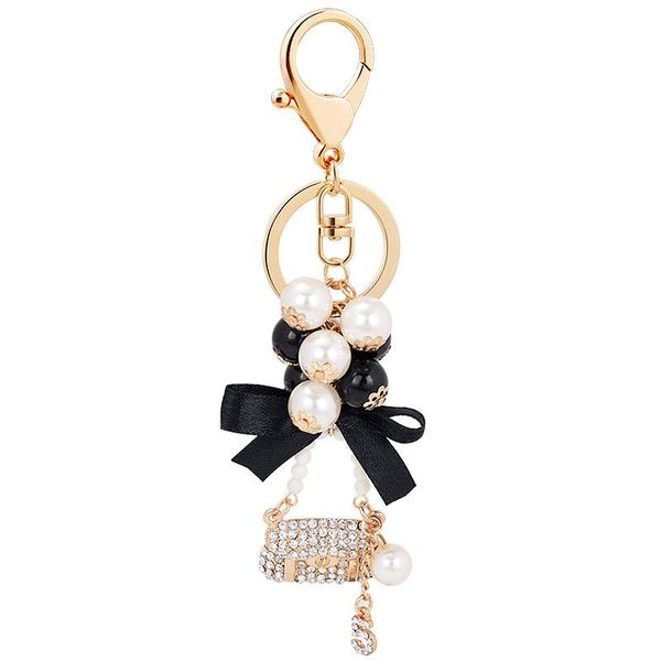 keychains pearl alloy metal handbag key chain fashion ring pom gifts for women girls bag charm keychain pendant jewelry, Silver
keychains pearl alloy metal handbag key chain fashion ring pom gifts for women girls bag charm keychain pendant jewelry, Silver
