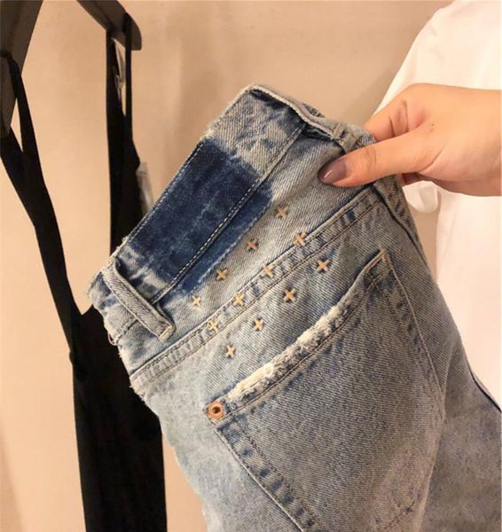 women's jeans the summer 2021 a detail of light blue cutting holes embroidery cowboy riding pants woman
women's jeans the summer 2021 a detail of light blue cutting holes embroidery cowboy riding pants woman