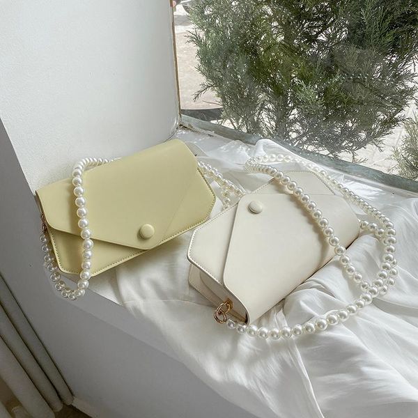 cross body pu fashion women leather handbags ladies pearl handle small shoulder bag designer female travel messenger bags
cross body pu fashion women leather handbags ladies pearl handle small shoulder bag designer female travel messenger bags