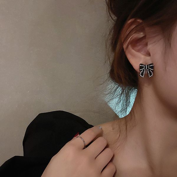 925 silver needle sweet pearl bow girl heart design simple cute earrings 
925 silver needle sweet pearl bow girl heart design simple cute earrings