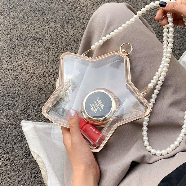 evening bags niche design transparent bag female summer wild 2021 fashion pearl chain five-pointed star shoulder width: 21cm
evening bags niche design transparent bag female summer wild 2021 fashion pearl chain five-pointed star shoulder width: 21cm