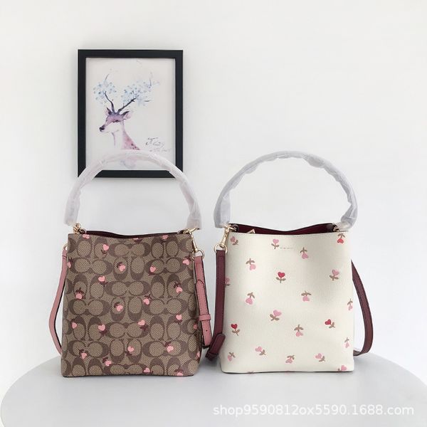 2021 new printing bucket love flower underarm single shoulder slant span portable women's bag crossbody bag ysj
2021 new printing bucket love flower underarm single shoulder slant span portable women's bag crossbody bag ysj