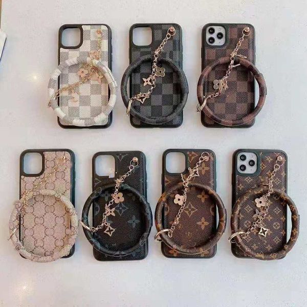 brand classic designer with chain and bracklet phone cases for iphone 12 promax 12pro 11 xs max xr x 8 plus
brand classic designer with chain and bracklet phone cases for iphone 12 promax 12pro 11 xs max xr x 8 plus