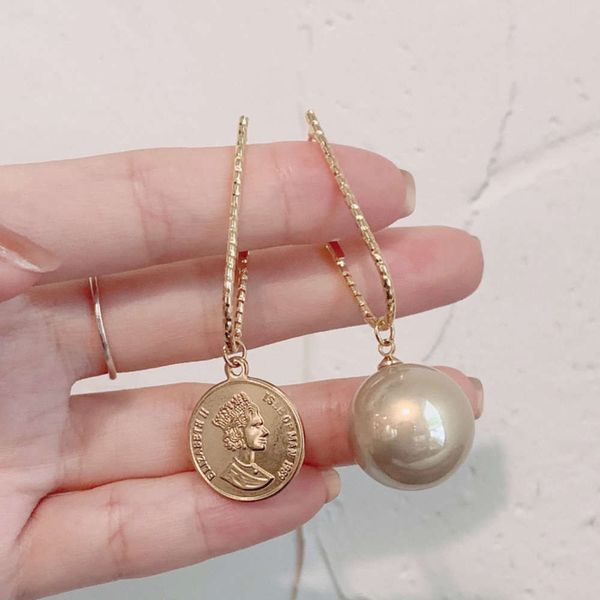 s925 silver needle 14k real gold korean asymmetric portrait pearl female personality earrings, Black
s925 silver needle 14k real gold korean asymmetric portrait pearl female personality earrings, Black