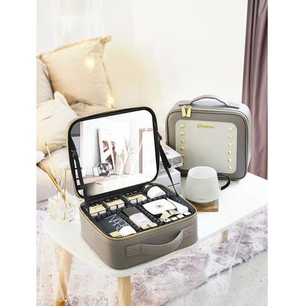 storage bags household and collection tools cosmetic bag fireproof portable large capacity lady's suitcase with mirror
storage bags household and collection tools cosmetic bag fireproof portable large capacity lady's suitcase with mirror