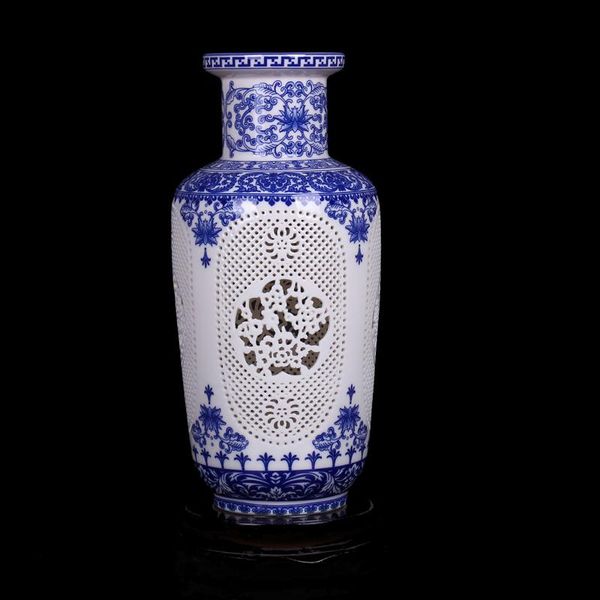 jingdezhen hollow ceramic vase chinese blue and white pierced living room decoration porcelain flower ornaments vases
jingdezhen hollow ceramic vase chinese blue and white pierced living room decoration porcelain flower ornaments vases