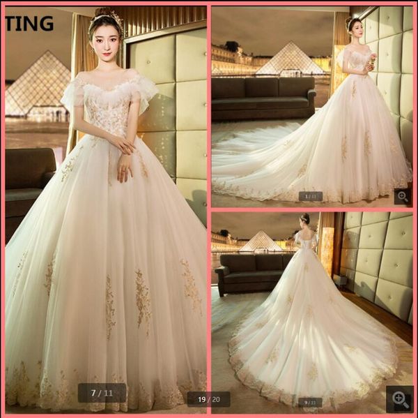 robe de mariage 2021 white tulle ball gown wedding dresses luxury gold lace appliques beaded sequins princess puffy bridal gowns court train
robe de mariage 2021 white tulle ball gown wedding dresses luxury gold lace appliques beaded sequins princess puffy bridal gowns court train