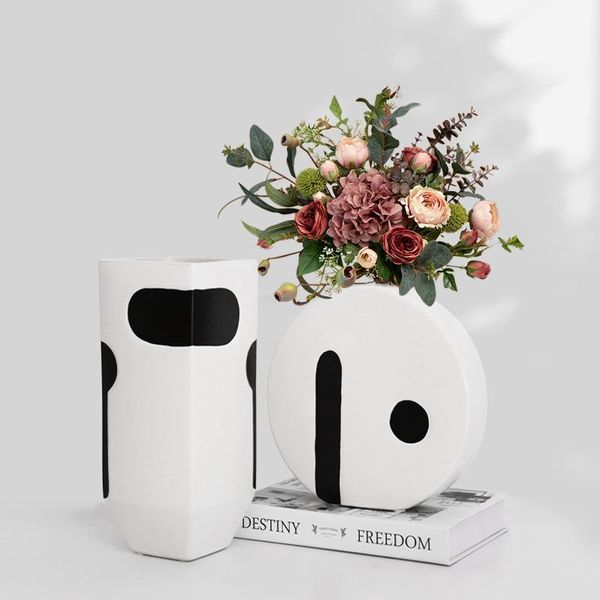 nordic modern light luxury black white contrast color ceramic vase for living room study bedroom showroom domestic ornament vases
nordic modern light luxury black white contrast color ceramic vase for living room study bedroom showroom domestic ornament vases