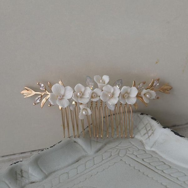 hair clips & barrettes slbridal alloy leaf ceramic flower rhinestones zircon freshwater pearls bridal comb wedding accessories women jewelry, Golden;silver
hair clips & barrettes slbridal alloy leaf ceramic flower rhinestones zircon freshwater pearls bridal comb wedding accessories women jewelry, Golden;silver
