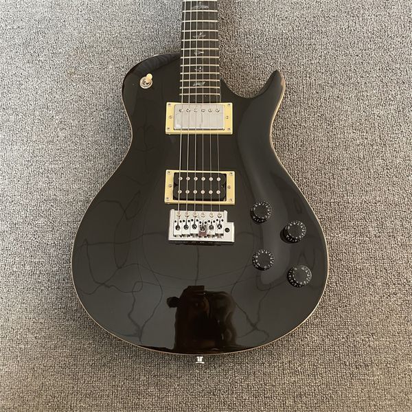 black electric guitar, ebony fingerboard, 2 p90 pickups, gold hardware, solid mahogany body electric guitar
black electric guitar, ebony fingerboard, 2 p90 pickups, gold hardware, solid mahogany body electric guitar