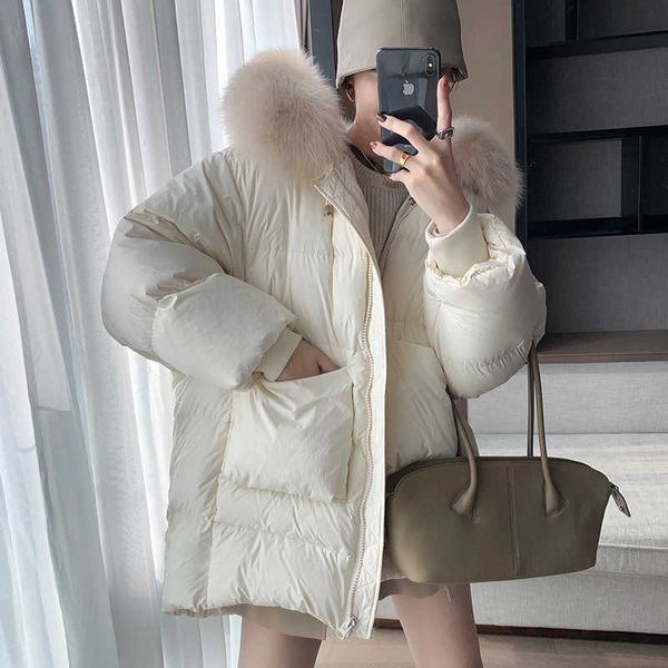 aunt cui's warm winter fox hair collar is gentle and loose, showing thin, hooded down et, feminine coat
aunt cui's warm winter fox hair collar is gentle and loose, showing thin, hooded down et, feminine coat