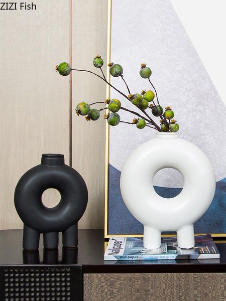 creative black and white hollow ceramic vase flower arrangement plant hydroponic pot living room deskdecoration vases
creative black and white hollow ceramic vase flower arrangement plant hydroponic pot living room deskdecoration vases
