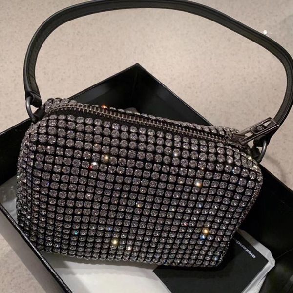 the water drill bag one-shoulder hand-held evening is a mini handbag with sloping bags
the water drill bag one-shoulder hand-held evening is a mini handbag with sloping bags