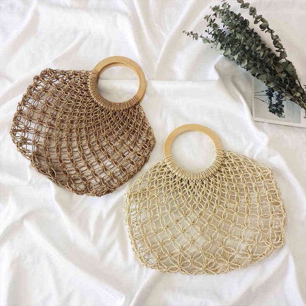 shopping bags women handbag summer handmade beach mesh bohemia straw wooden round handle knitting net hollow woven vacation tote 220303
shopping bags women handbag summer handmade beach mesh bohemia straw wooden round handle knitting net hollow woven vacation tote 220303