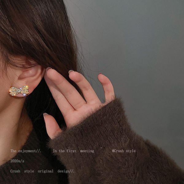 925 silver needle bowknot zircon inlaid with diamond pearl small net red simple fashion temperament earrings
925 silver needle bowknot zircon inlaid with diamond pearl small net red simple fashion temperament earrings