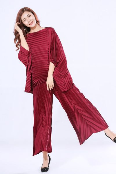two piece dress miyake suit fold batwing sleeve t-shirt + nine points wide-legged pants light fabric folds loose two-piece outfit in stock, White
two piece dress miyake suit fold batwing sleeve t-shirt + nine points wide-legged pants light fabric folds loose two-piece outfit in stock, White