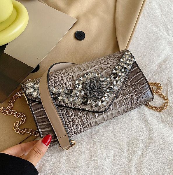 factory wholesale leather women shoulder bags elegant metal carved chain bag exotic wild diamond-encrusted handbags street crocodile handbag
factory wholesale leather women shoulder bags elegant metal carved chain bag exotic wild diamond-encrusted handbags street crocodile handbag