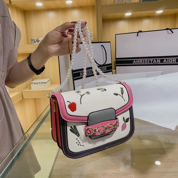design bag french summer contrast color saddle fashion pearl embossed single shoulder messenger bag simple texture small square
design bag french summer contrast color saddle fashion pearl embossed single shoulder messenger bag simple texture small square