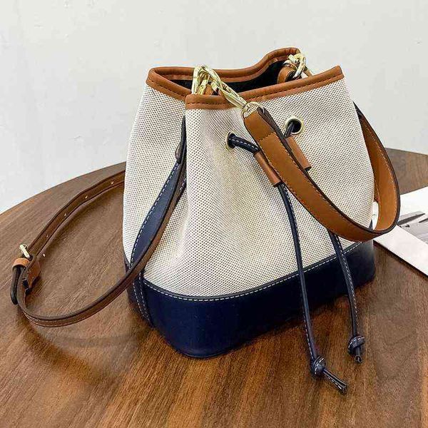 cute tote bag 2020 new korean style women drawstring bag ladies bucket crossbody bag fashion wide strap leather shoulder handbag y220304
cute tote bag 2020 new korean style women drawstring bag ladies bucket crossbody bag fashion wide strap leather shoulder handbag y220304