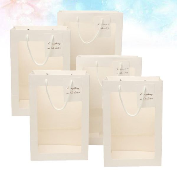 5pcs portable flower paper bag handheld transparent window gift package containers wrap
5pcs portable flower paper bag handheld transparent window gift package containers wrap