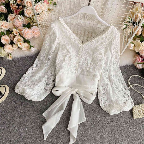 spring black/white v-neck blouse women hollow embroidery female elegant beading lantern sleeve bandage shirt 210525
spring black/white v-neck blouse women hollow embroidery female elegant beading lantern sleeve bandage shirt 210525