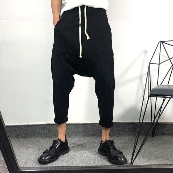men's pants spring and summer men's solid color elastic waist white lace-up design loose halter harlan thin leg roll edge foot, Black
men's pants spring and summer men's solid color elastic waist white lace-up design loose halter harlan thin leg roll edge foot, Black