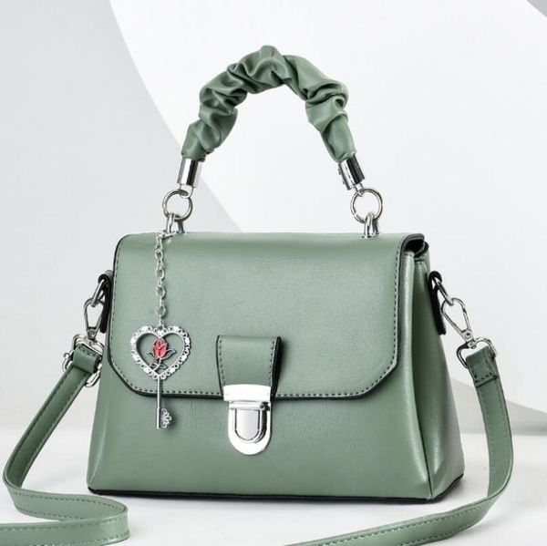 shoulder bags love pendant women bag european american fashion leather handbag female handle simple style
shoulder bags love pendant women bag european american fashion leather handbag female handle simple style