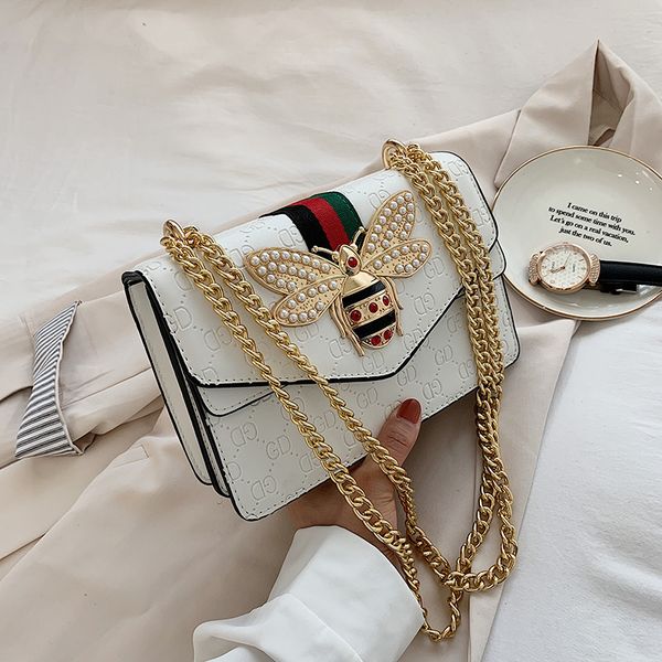 design jewelry women's new trendy korean version fashion versatile bee small square ins single shoulder messenger bag chain bag
design jewelry women's new trendy korean version fashion versatile bee small square ins single shoulder messenger bag chain bag