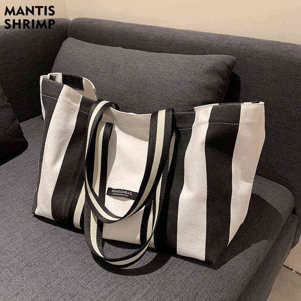 shopping bags new trend large capacity tote designer striped handbags for women female casual shoulder 220307
shopping bags new trend large capacity tote designer striped handbags for women female casual shoulder 220307