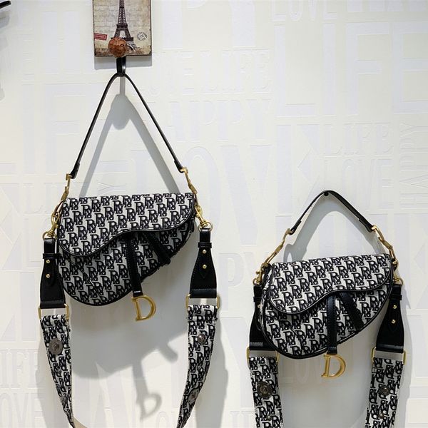 70% off discount store 2021 new d family embroidered canvas saddle star same letter messenger single shoulder bag women's bag fashion
70% off discount store 2021 new d family embroidered canvas saddle star same letter messenger single shoulder bag women's bag fashion
