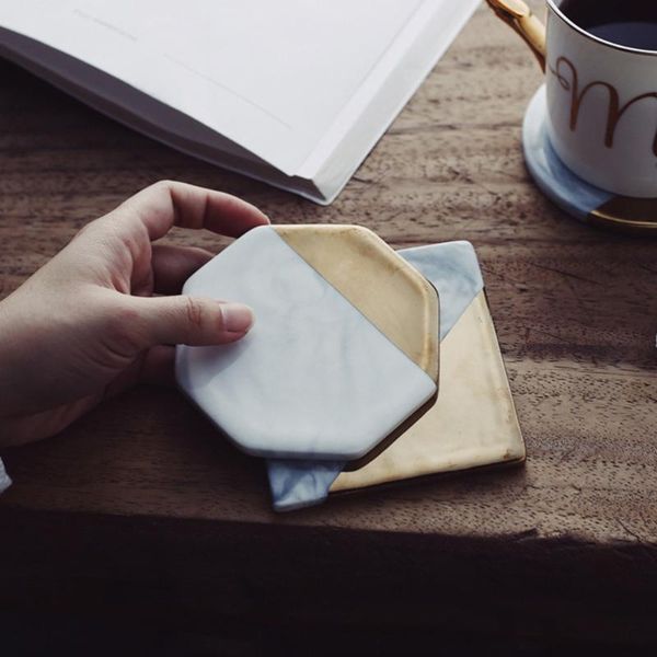 mats & pads nordic style gold-plated marbled ceramic teacup coasters creative insulation pad for drinks(octagon)
mats & pads nordic style gold-plated marbled ceramic teacup coasters creative insulation pad for drinks(octagon)