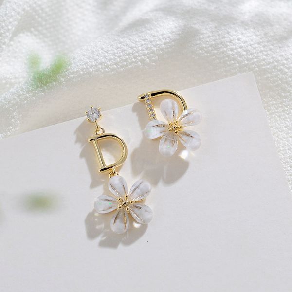 korean s925 sier ear nail fairy flower daisy earrings letter d asymmetric personality earrings, Golden
korean s925 sier ear nail fairy flower daisy earrings letter d asymmetric personality earrings, Golden