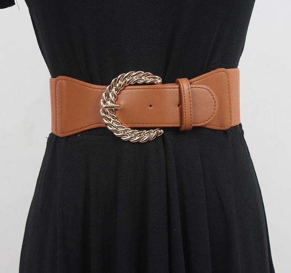belts the belted woman's wide-brimmed dress was styled with a brown black loose elastic belt, Black;brown
belts the belted woman's wide-brimmed dress was styled with a brown black loose elastic belt, Black;brown