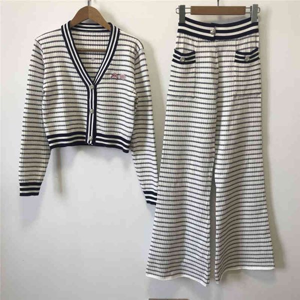2022 factory wholesale new model autumn and winter ba tong striped short long sleeved knitted cardigan casual wide leg flared pants set wome, White
2022 factory wholesale new model autumn and winter ba tong striped short long sleeved knitted cardigan casual wide leg flared pants set wome, White
