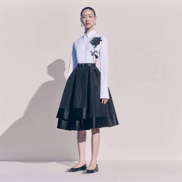 female assemblies track spring printed white shirt double layer skirt elegant two-piece suit, Black
female assemblies track spring printed white shirt double layer skirt elegant two-piece suit, Black