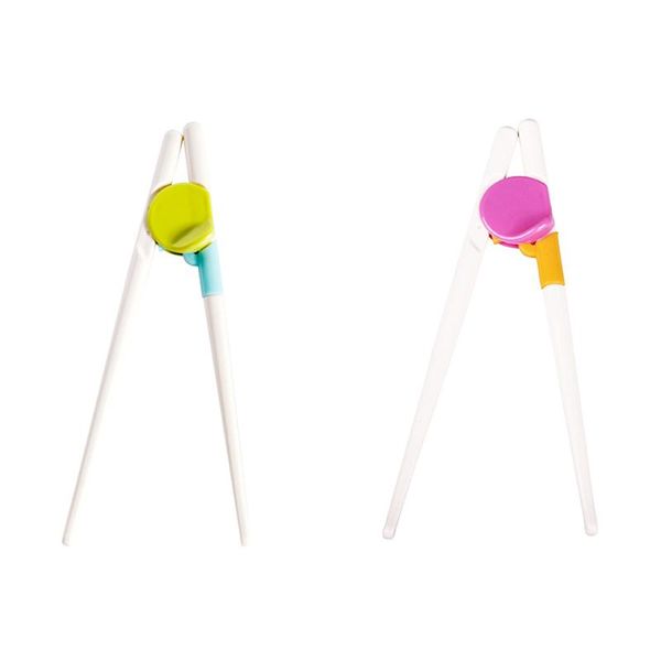 pair children kids beginner chopsticks training helper learning easy use colors:pink 
pair children kids beginner chopsticks training helper learning easy use colors:pink