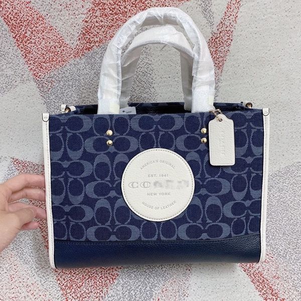(purchasing grade) new dempsey series tote one shoulder messenger bag, printed canvas fabric.
(purchasing grade) new dempsey series tote one shoulder messenger bag, printed canvas fabric.