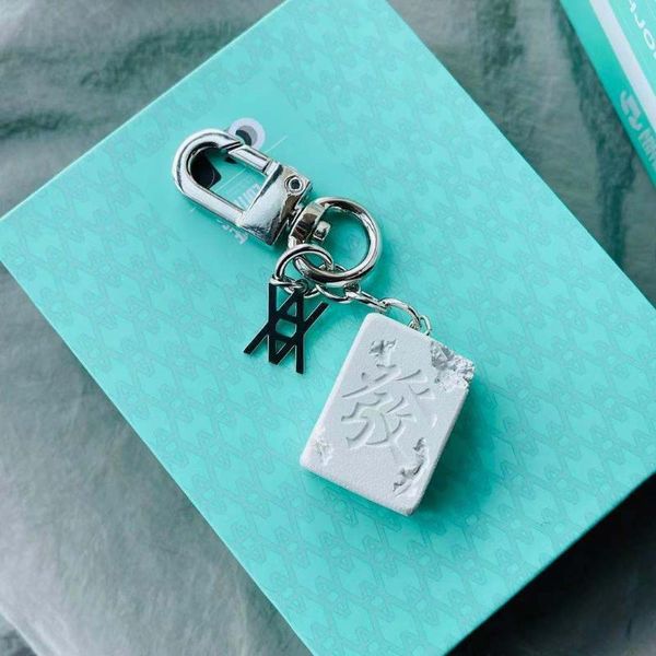 keychains spring/summer daniel arsham eroded mahjong fair limited metal cool facai key ring, Silver
keychains spring/summer daniel arsham eroded mahjong fair limited metal cool facai key ring, Silver