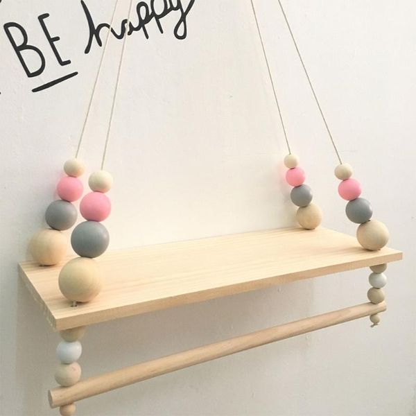 nordic wood wall shelf with clothes rack children room decorative storage rope hanging kids bedroom living decoration other home decor 
nordic wood wall shelf with clothes rack children room decorative storage rope hanging kids bedroom living decoration other home decor