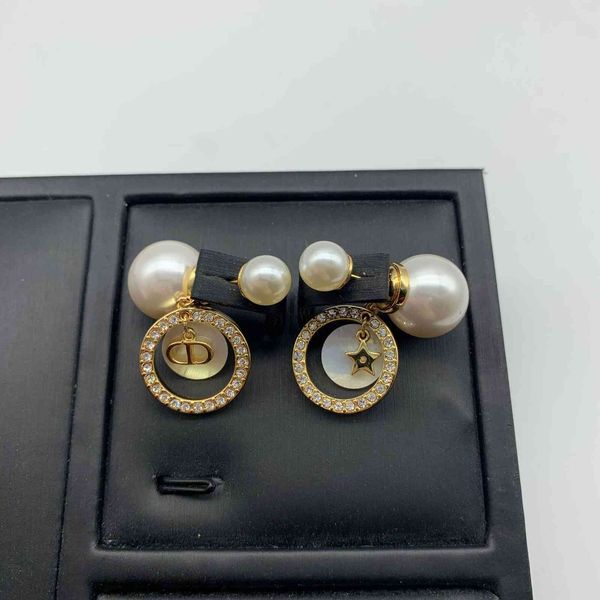 2021 new designer letter pearl white fritillaria full diamond star earrings female family small fragrance high version silver needle, Golden
2021 new designer letter pearl white fritillaria full diamond star earrings female family small fragrance high version silver needle, Golden