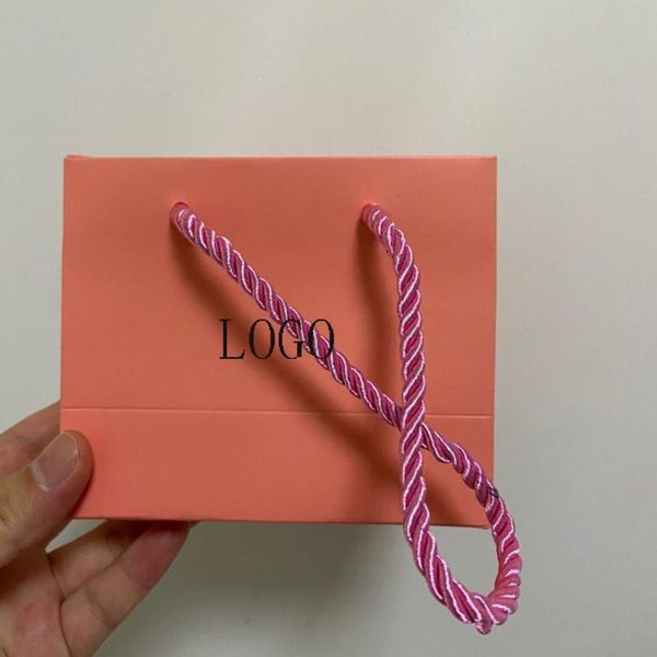 gift wrap 10pcs custom logo pink kraft paper clothing bag candy box handle wedding party handbag shopping bags
gift wrap 10pcs custom logo pink kraft paper clothing bag candy box handle wedding party handbag shopping bags