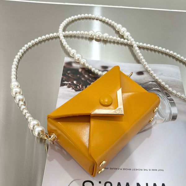 spring and summer mini square bag women's fashion envelope bag pearl chain personality one-shoulder messenger bags
spring and summer mini square bag women's fashion envelope bag pearl chain personality one-shoulder messenger bags
