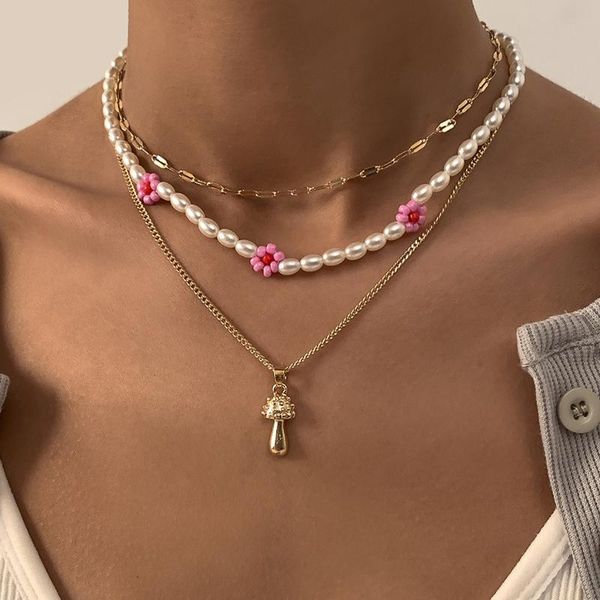 chokers vintage multilayer pearl beads choker necklaces for women girls cute mushroom pendant layered chain jewelry 2021, Golden;silver
chokers vintage multilayer pearl beads choker necklaces for women girls cute mushroom pendant layered chain jewelry 2021, Golden;silver