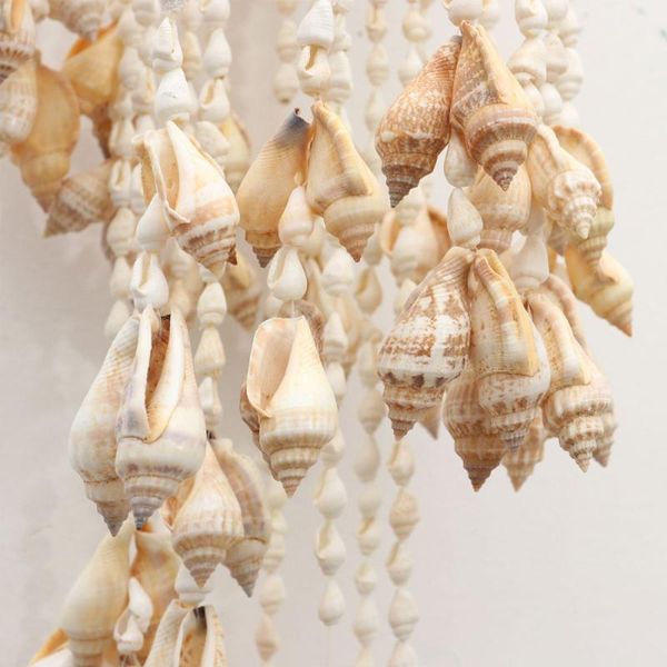 conch sea shell wind chime hanging ornament wall decoration creative pendant stylish decor for decorative objects & figurines
conch sea shell wind chime hanging ornament wall decoration creative pendant stylish decor for decorative objects & figurines