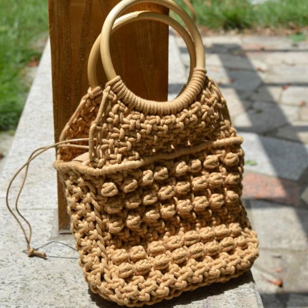 style lining solid color portable woven bag handmade cotton rope beach leisure straw totes
style lining solid color portable woven bag handmade cotton rope beach leisure straw totes