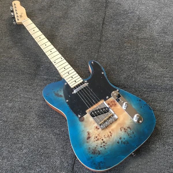 high cost performance-6 strings transparent blue electric guitar with burl maple veneer,black pickguard
high cost performance-6 strings transparent blue electric guitar with burl maple veneer,black pickguard