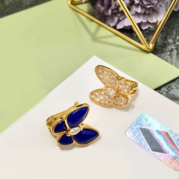 08 fashion gold plated copper lucky windmill diamond double butterfly earrings between lapis lazuli, Golden
08 fashion gold plated copper lucky windmill diamond double butterfly earrings between lapis lazuli, Golden