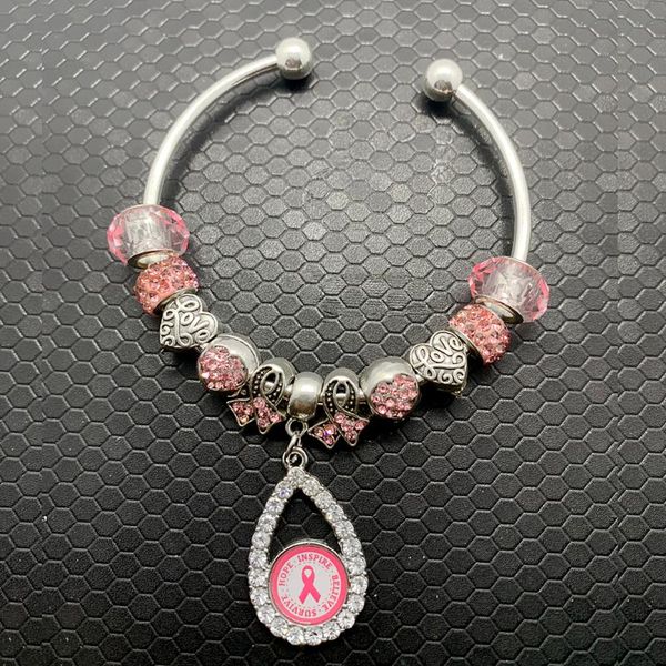 beaded, strands pink rhinestone inlaid metal ribbon charm big hole glass bead opening wire bangle, Black
beaded, strands pink rhinestone inlaid metal ribbon charm big hole glass bead opening wire bangle, Black
